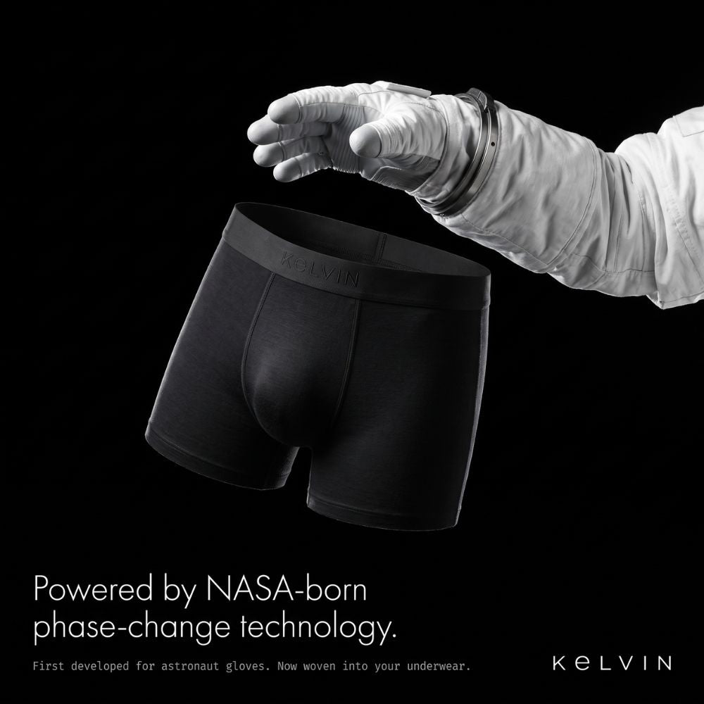 Astronaut glove releasing a Kelvin boxer brief in zero gravity